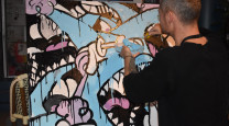 Art Battle Auckland’s first Spotlight artist Kelly Williams is stepping up to the canvas once again  photo