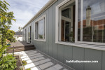 Exterior painted in Resene Blue Smoke with Resene Sea Fog trims