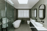 Bathroom, bathroom featuring grey tiles and Resene Quarter Albescent White