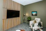 Media room, earthy green media room, media room featuring Resene Raptor