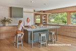 Kitchen painted in Resene Double Lemon Grass and with timber flooring and features