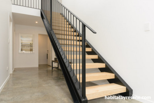 resene alabaster, white walls, scandi design, white entrance, entranceway, hallway, steel staircase