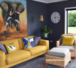 modern French country, black living room, navy lounge, yellow couch, elephant art 