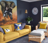 modern French country, black living room, navy lounge, yellow couch, elephant art 