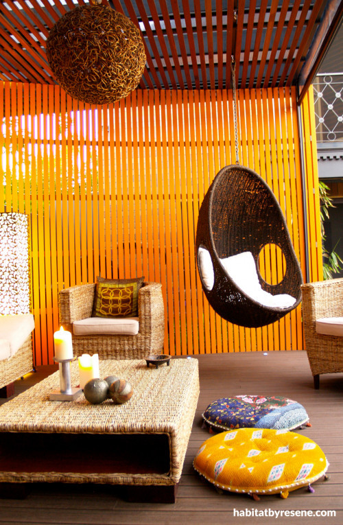 pavilion, orange paint, hanging char, feature wall, timber, contemporary garden, modern exterior