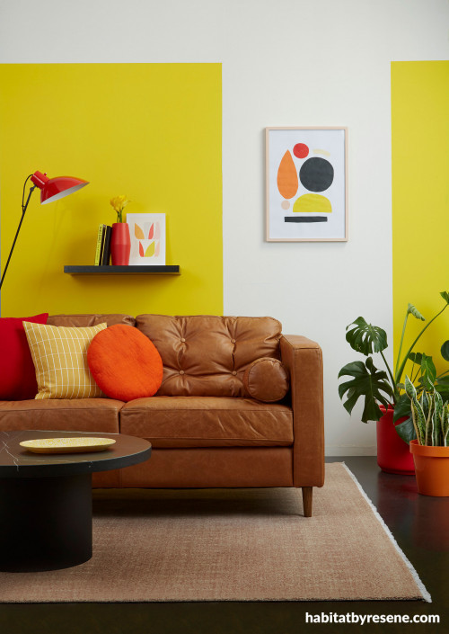 lounge, living room, yellow lounge, yellow living room, leather couch, yellow feature wall