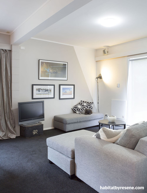 white living room, lounge, white paint, grey couch, dark carpet