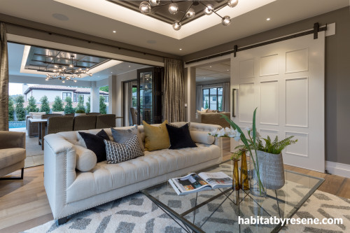 home cinema, tv room, lounge, living room, grey lounge, neutral lounge, barn door, grey interior